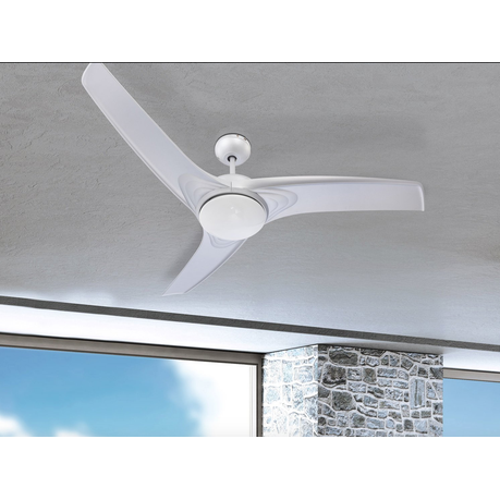 Modern ceiling fan mounted on a ceiling with a window and stone wall in the background