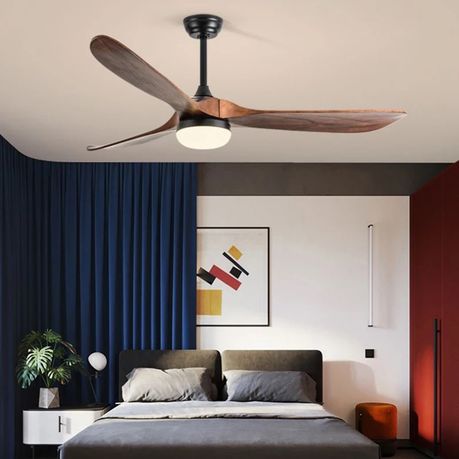 52-inch ceiling fan with remote, walnut wood blades, LED light and reversible motor for stylish, quiet indoor airflow and energy-efficient comfort.