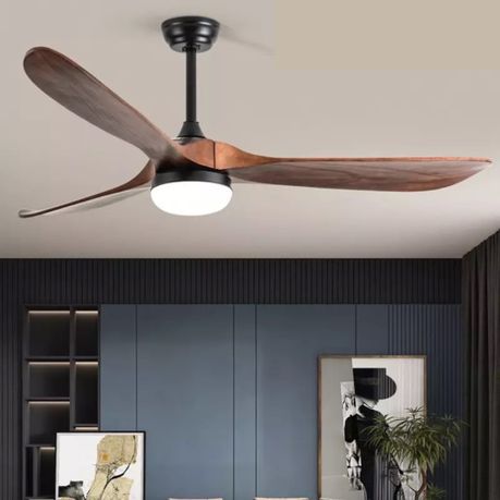 Ceiling fan with wooden blades in a modern interior setting