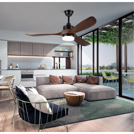Modern living room with a sectional sofa, coffee table, and ceiling fan.