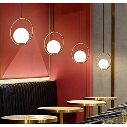 Gold modern pendant light with frosted glass shade, E27 fitting, warm ambient glow, ideal for kitchens, dining areas, and contemporary interiors.