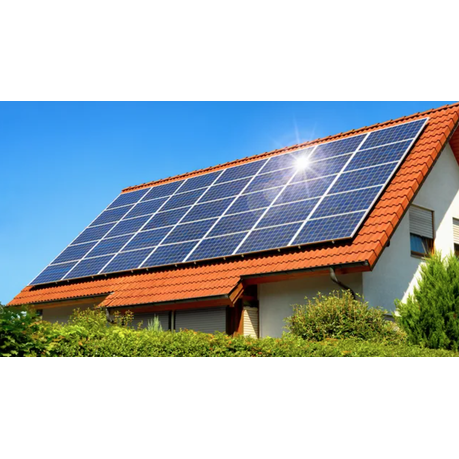 Solar panels on a house roof with a clear blue sky