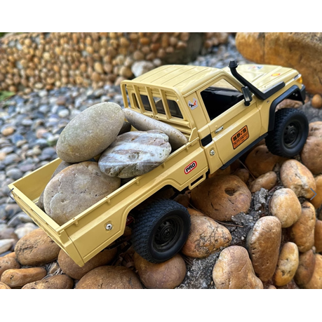 1:12 RC Land Cruiser rock crawler with 4WD, rugged suspension, and rechargeable battery—ideal for off-road fun and outdoor terrain adventures.