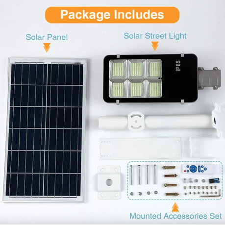 Solar panel and street light with mounted accessories on a white background
